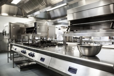 Work surface and kitchen equipment in professional kitchen-1