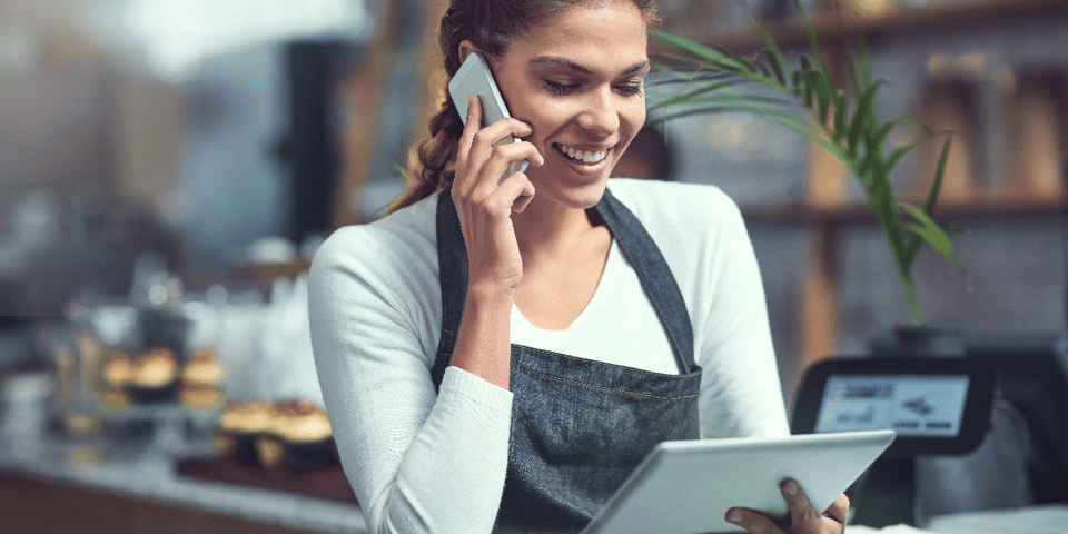 worker on phone and tablet